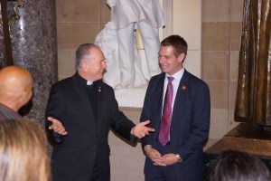 Reverend Patrick Conroy with Congressman Swalwell