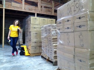 GoldieBlox Founder Debbie Sterling with the First Shipment of GoldieBlox Toys