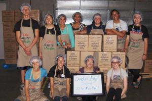 Kids Against Hunger packing event